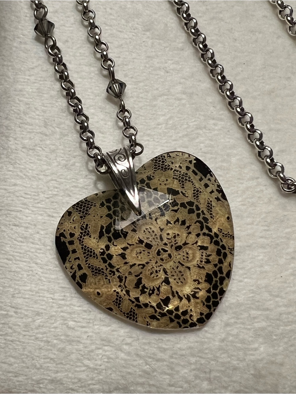 Brighton Gold Lace Heart Pendant Necklace with Black Background